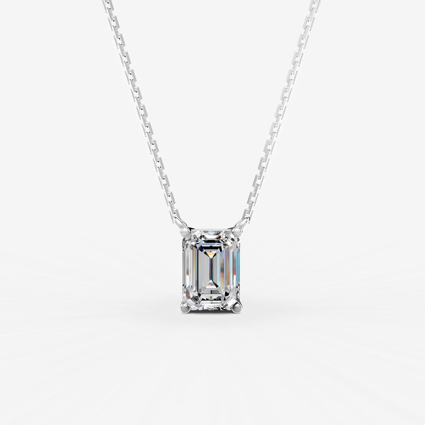 Classic Emerald Solitaire Pendant in 18K White Gold