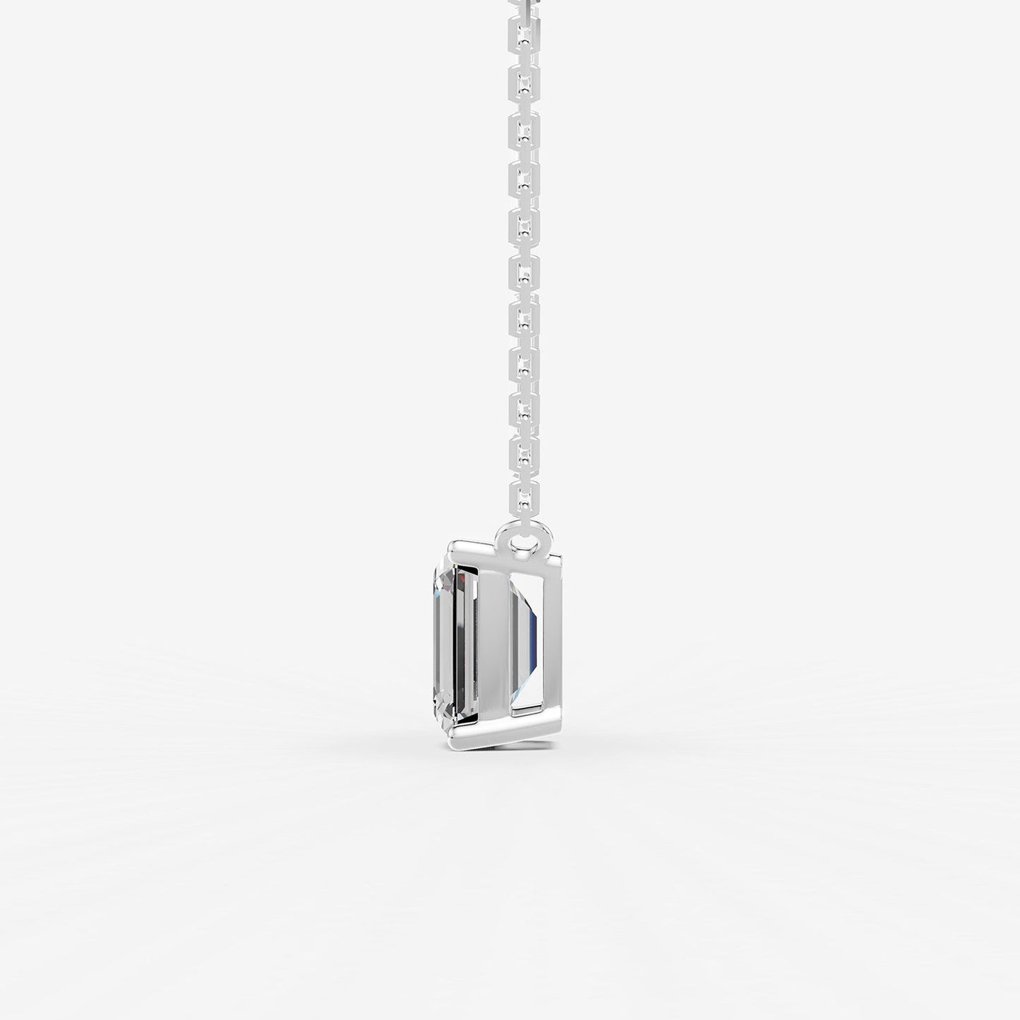Classic Emerald Solitaire Pendant in 18K White Gold