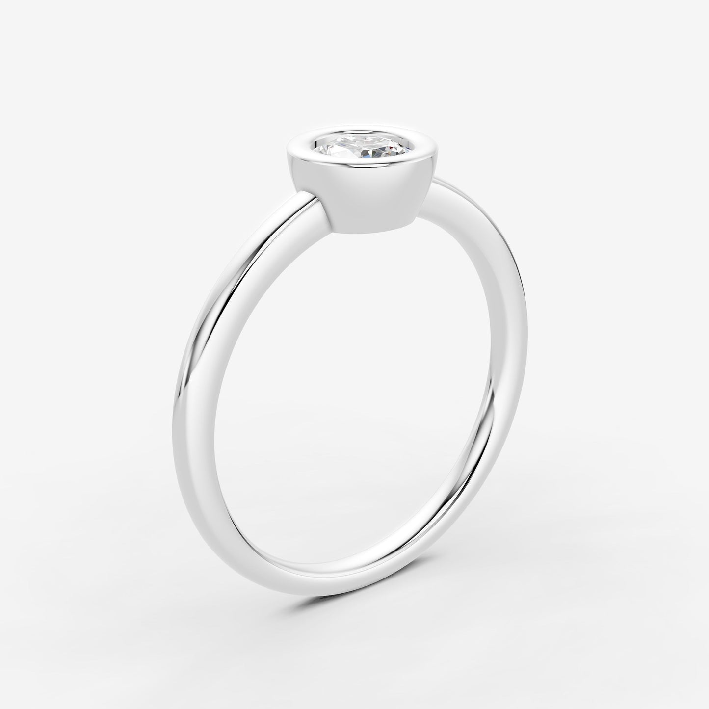 Bezel Round Solitaire Ring in 18K White Gold