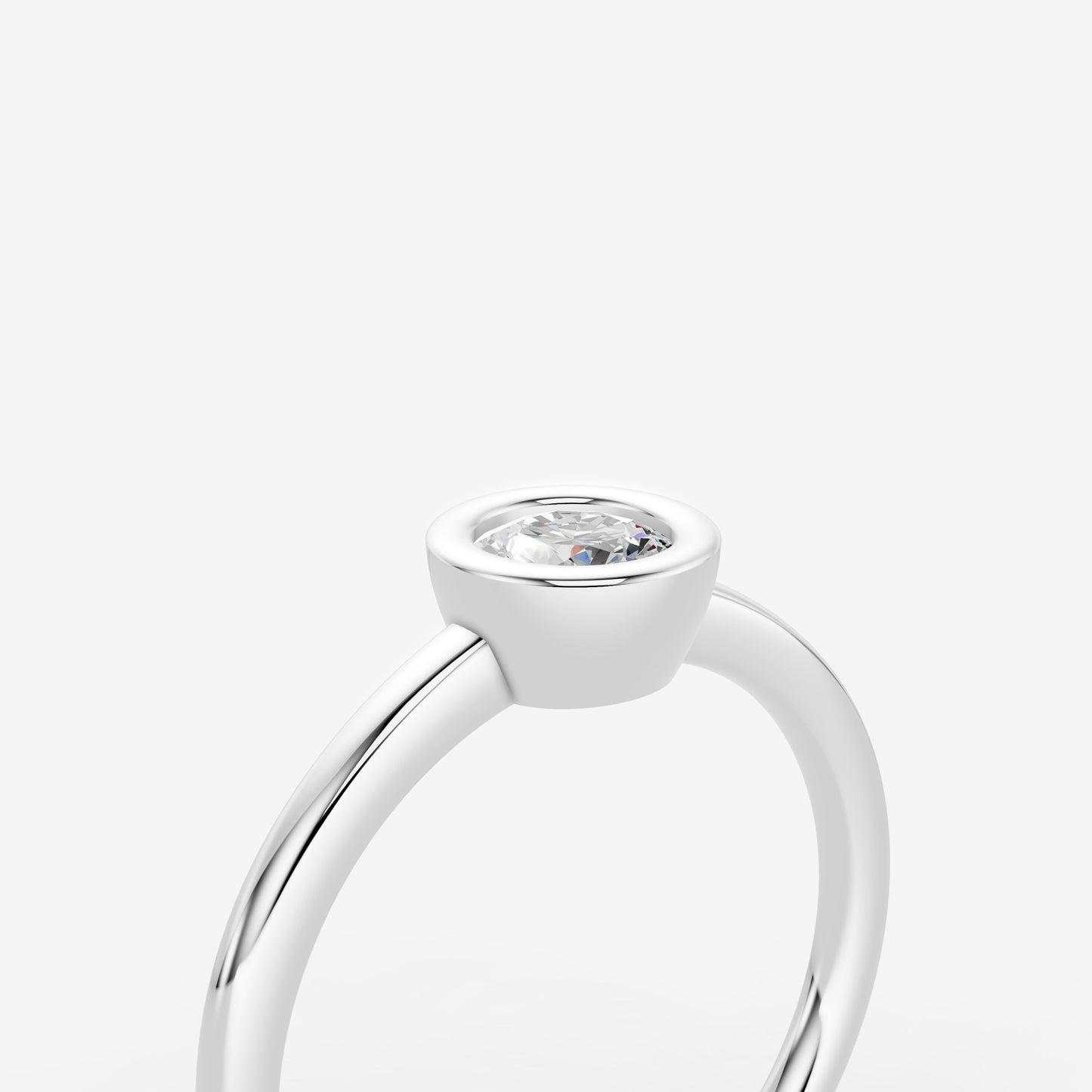 Bezel Round Solitaire Ring in 18K White Gold