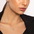 Delicate Triangle Pendant with dancing Diamond and chain in 18K White Gold