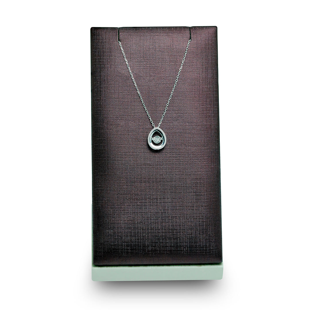 Delicate Oval Pendant with dancing Diamond and chain in 18K White Gold