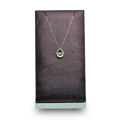 Delicate Oval Pendant with dancing Diamond and chain in 18K Yellow Gold