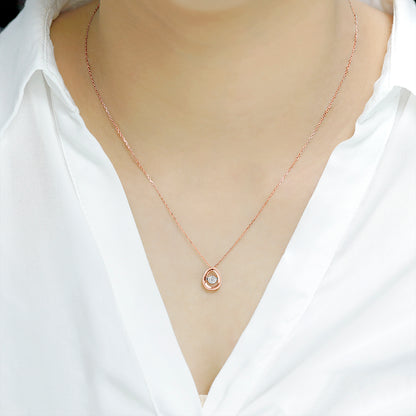 Delicate Oval Pendant with dancing Diamond and chain in 18K Rose Gold