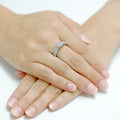 Engagement ring with diamond band in 18K white gold