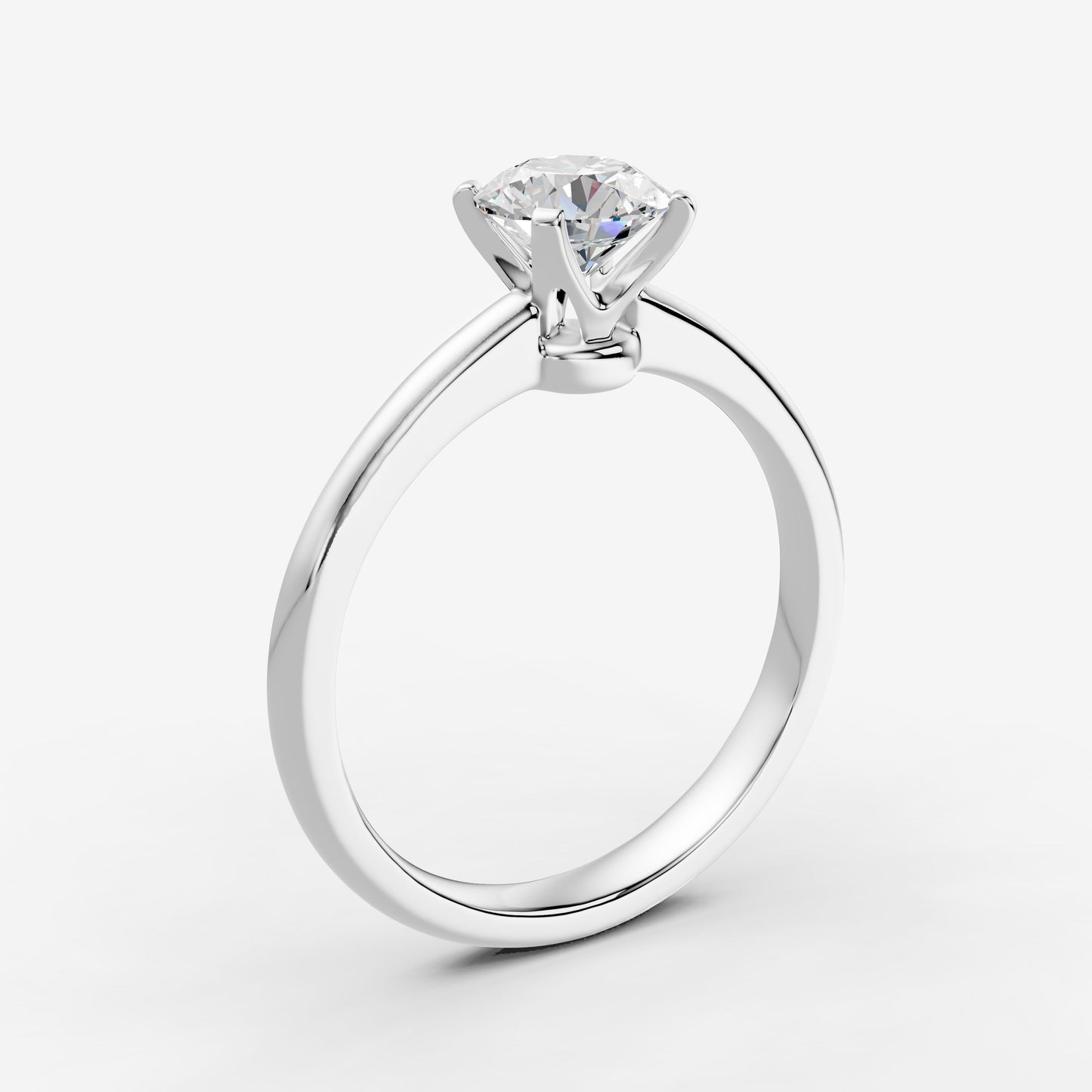 Classic Round Solitaire Ring in 18K White Gold